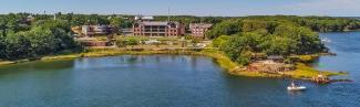 An aerial image of the coastline on U N E's Biddeford campus